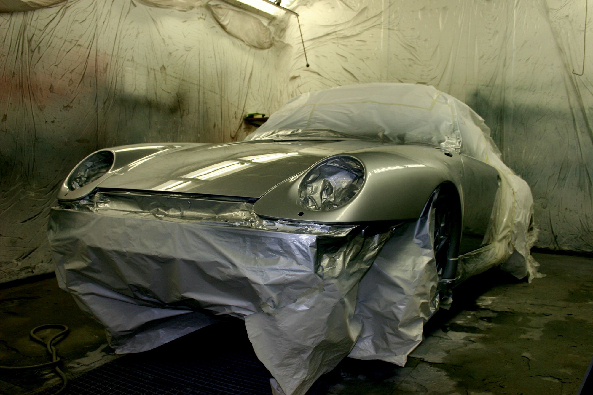 Backgound image of backgroundImages/Porsche_spachteln_lackiert.jpg